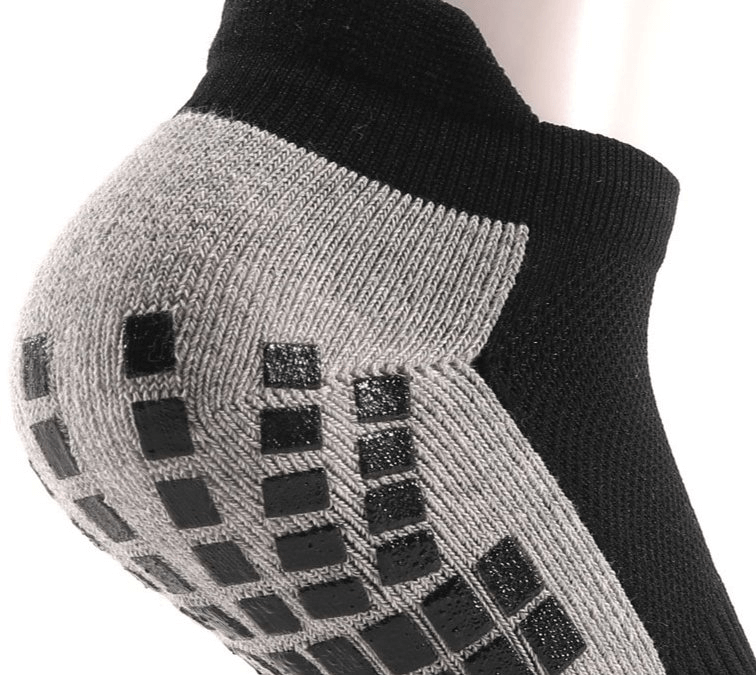 Close-up of stylish breathable non-slip sports sock with silicone grips, perfect for football. Unisex, tear-resistant design.